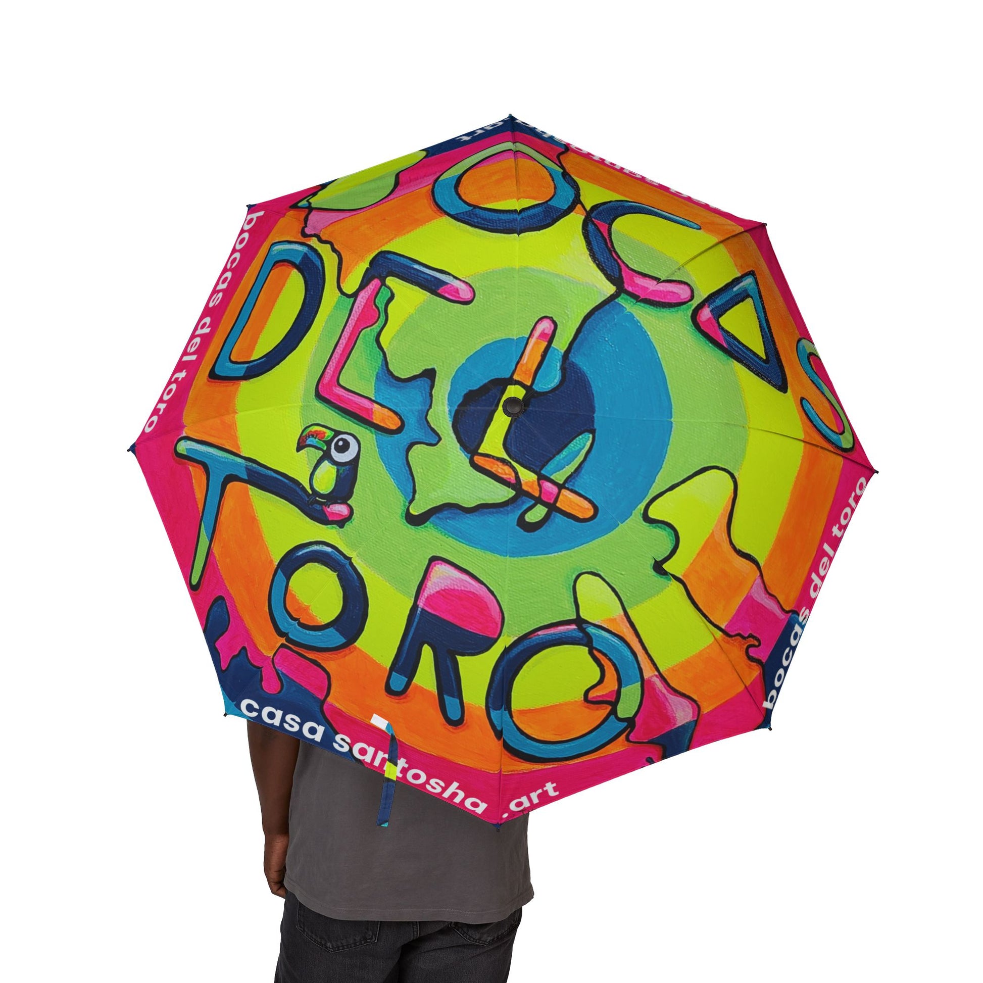 Colorful umbrella with abstract designs and text on a white background